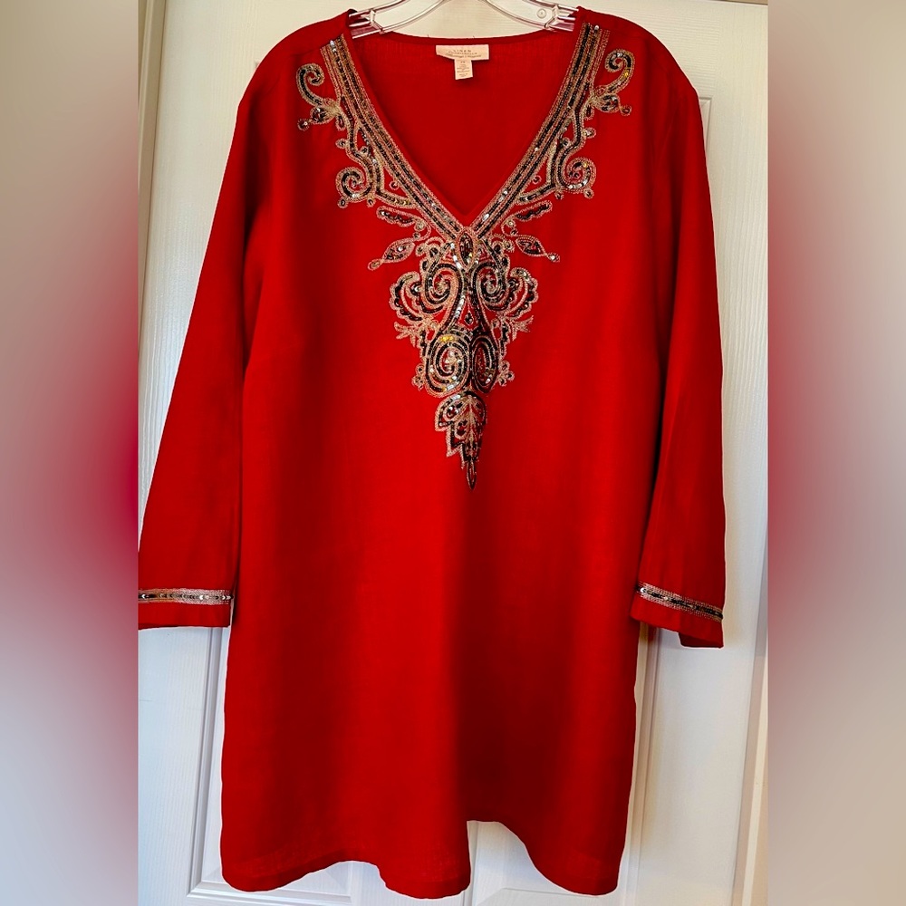 Beautifully detailed in sequence tunic.